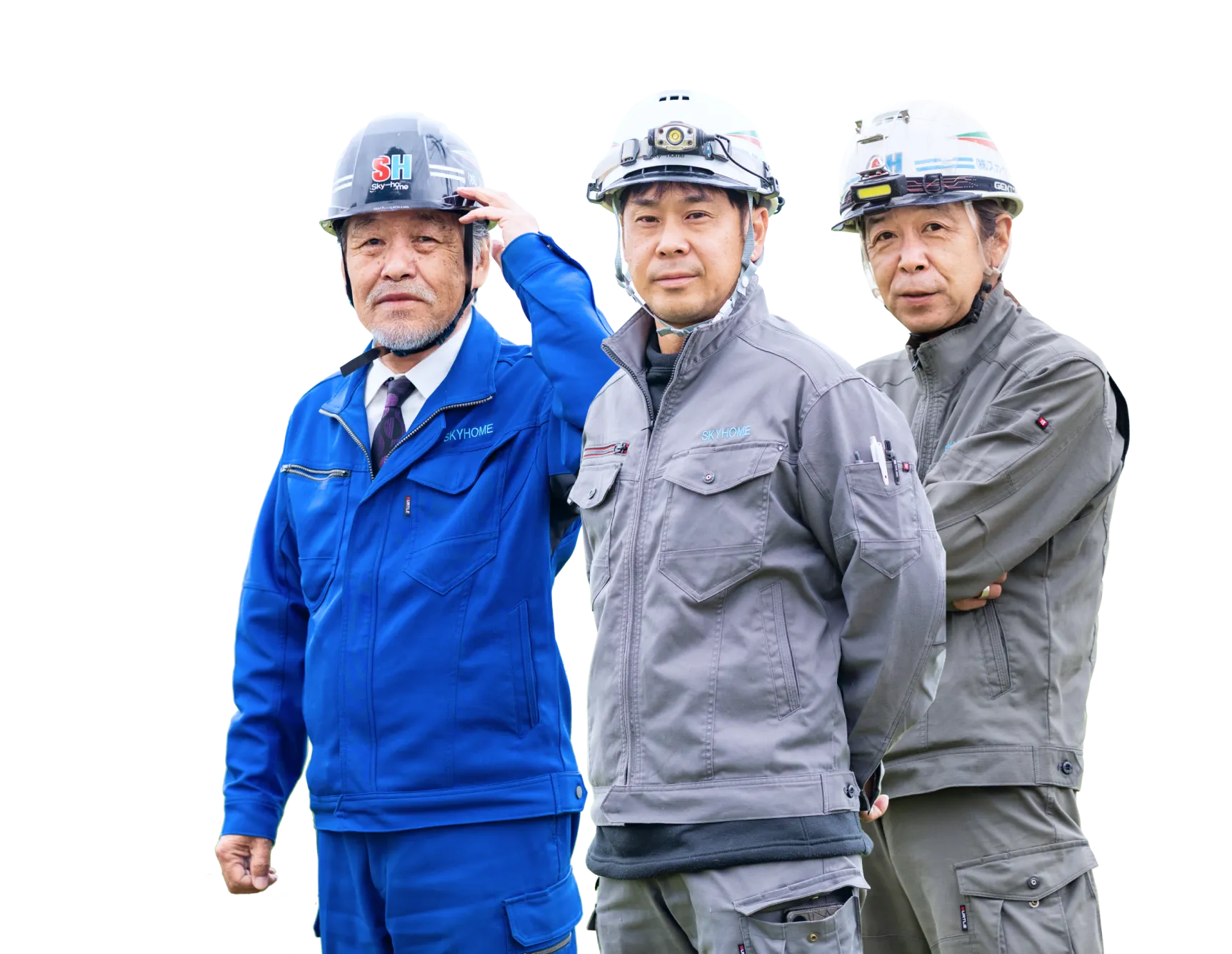 もっと現場で勝負したいと思うなら、スカイホームで［主役］になる。図面を広げて打ち合わせをする社員たち
